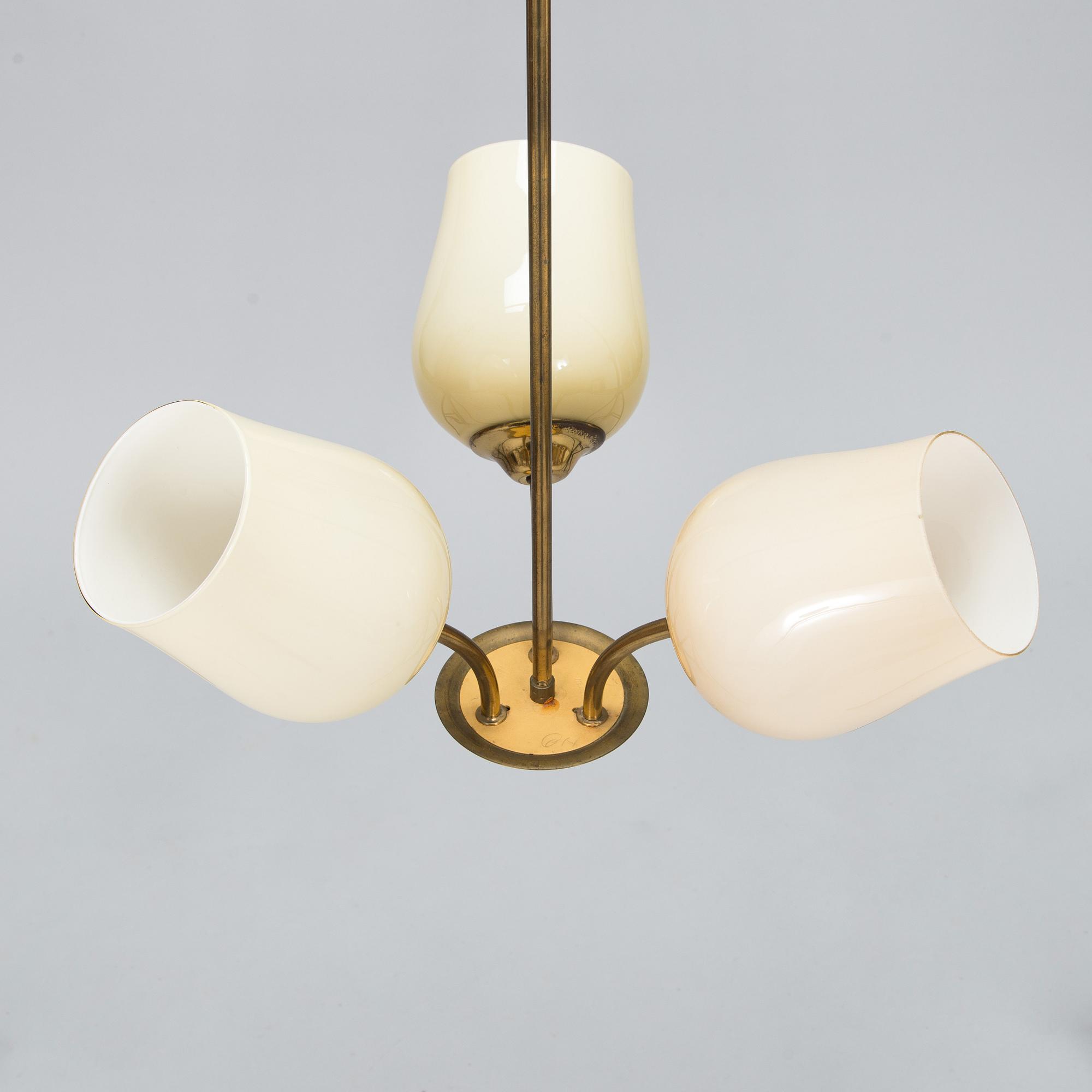 A mid 20th century brass pendant ceiling light, manufactured by Itsu, Finland.