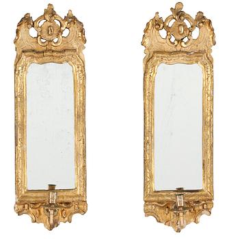 490. A pair of Italien 18th/19th Century one-light girandole mirrors.
