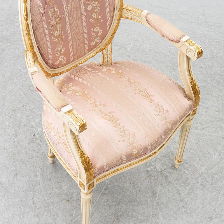 Dining table and armchair, Louis XVI style. Italy, second half of the 20th century.