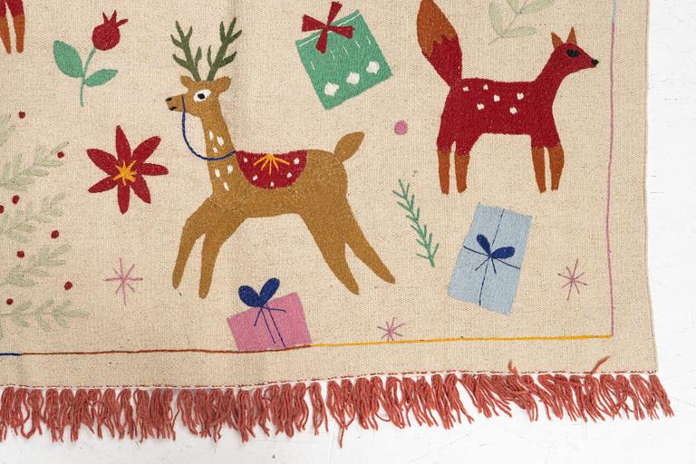 A hand-embroidered Kilim rug, c. 185 x 125 cm.