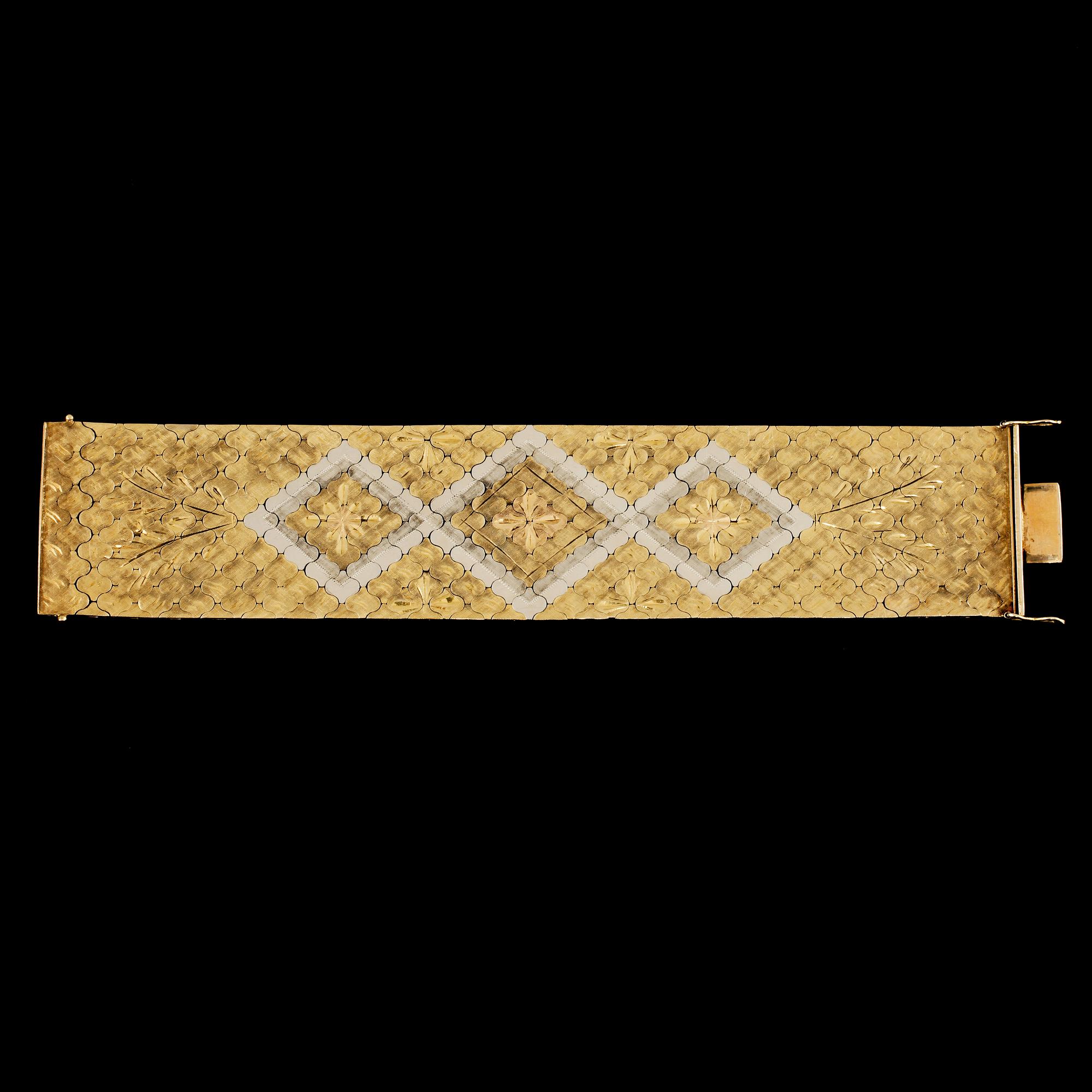 ARMLÄNK, 18k guld och vitguld, Italien, 1900-talets andra hälft. Vikt 128 g.