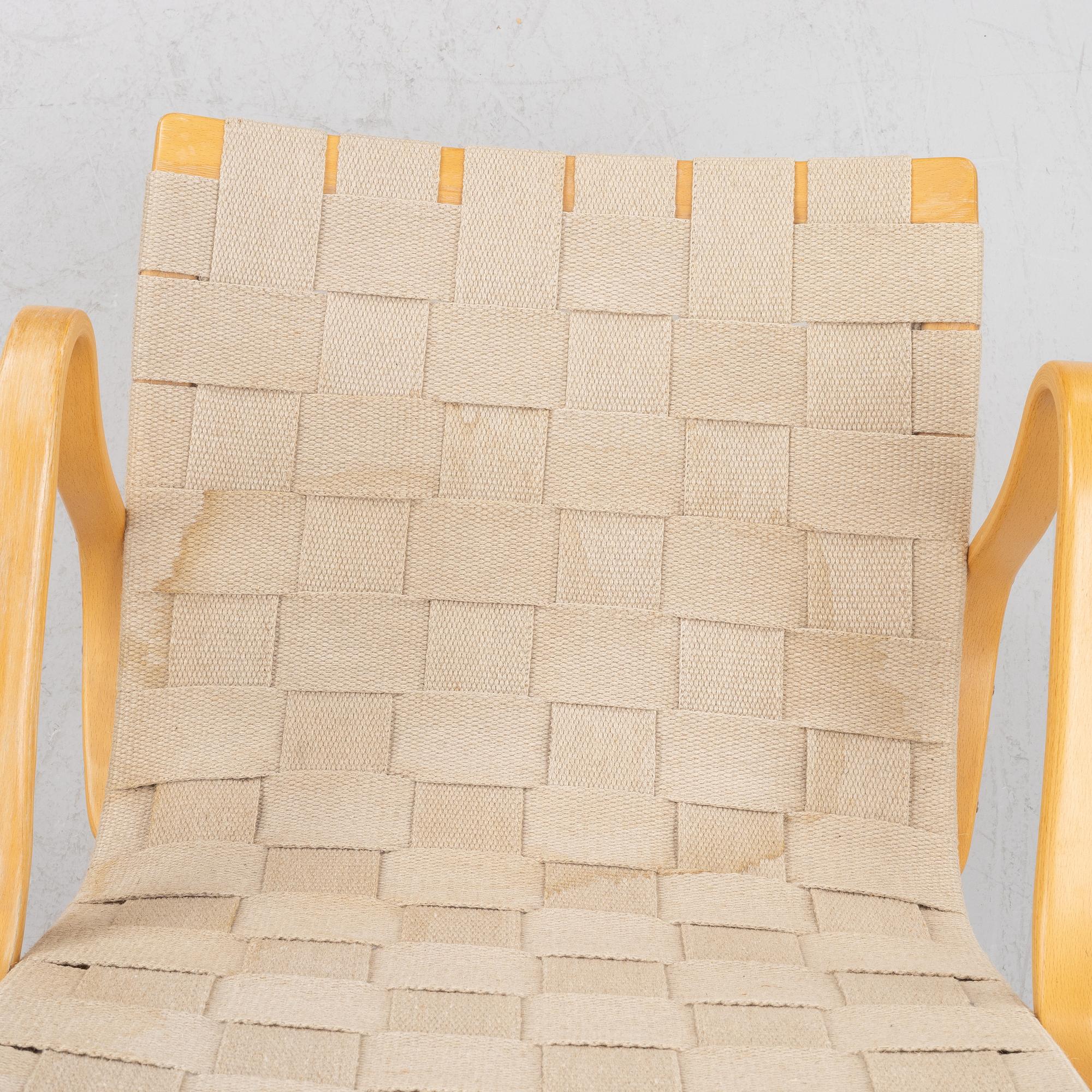 Bruno Mathsson, a pir of 'Eva' armchairs, Dux, late 20th century.