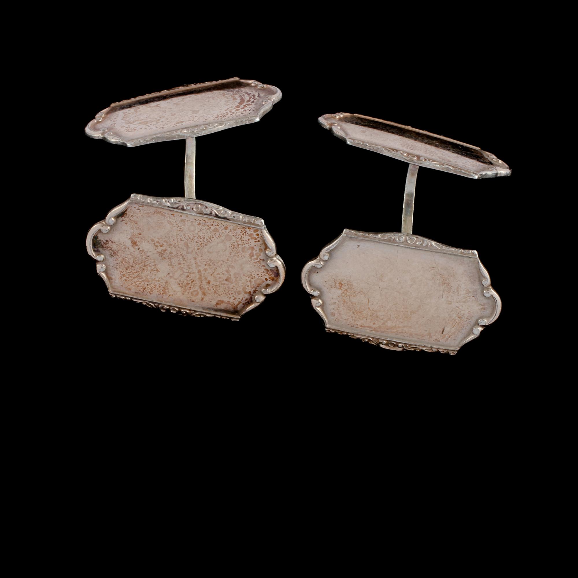 MANSCHETTKNAPPAR, silver, Gustav Dahlgren & Co, Malmö, 1941. Vikt 8,5 g.