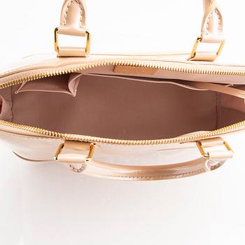 Louis Vuitton, an "Alma PM" handbag.