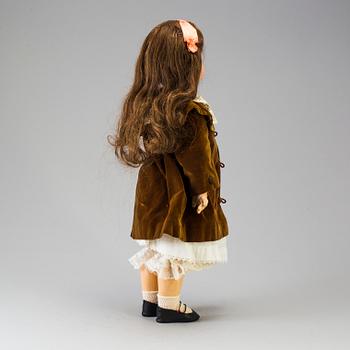 A Tete Jumeau bisque headed doll, France, late 19th century.