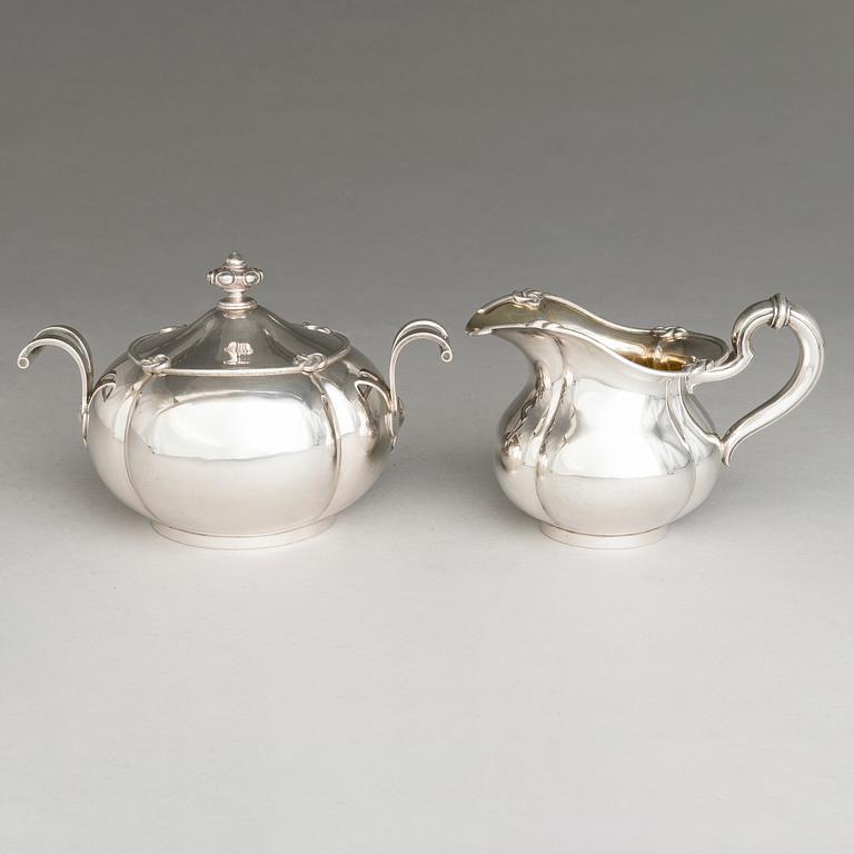SAZIKOV, A 5-piece silver coffee and tea set, mark of the Sazikov Firm, Imperial Warrant, Saint Petersburg 1860.