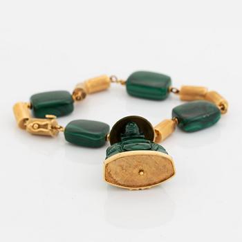 A 14K gold and malachite bracelet.