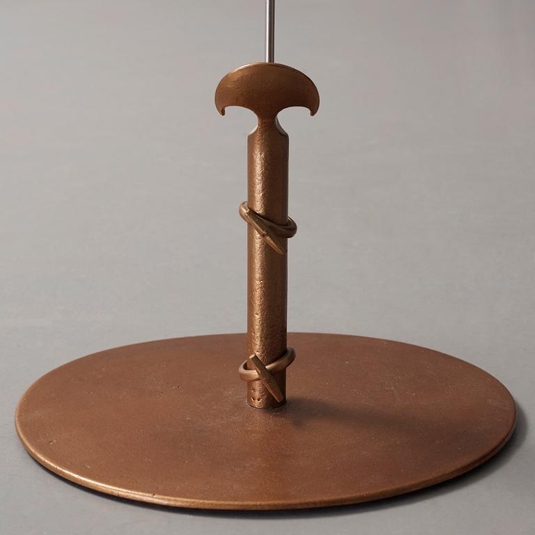 Tore Ahlsén, a bronze and white metal floor lamp, 'Napoleon on the Nile', probably executed by NK, 1940's.