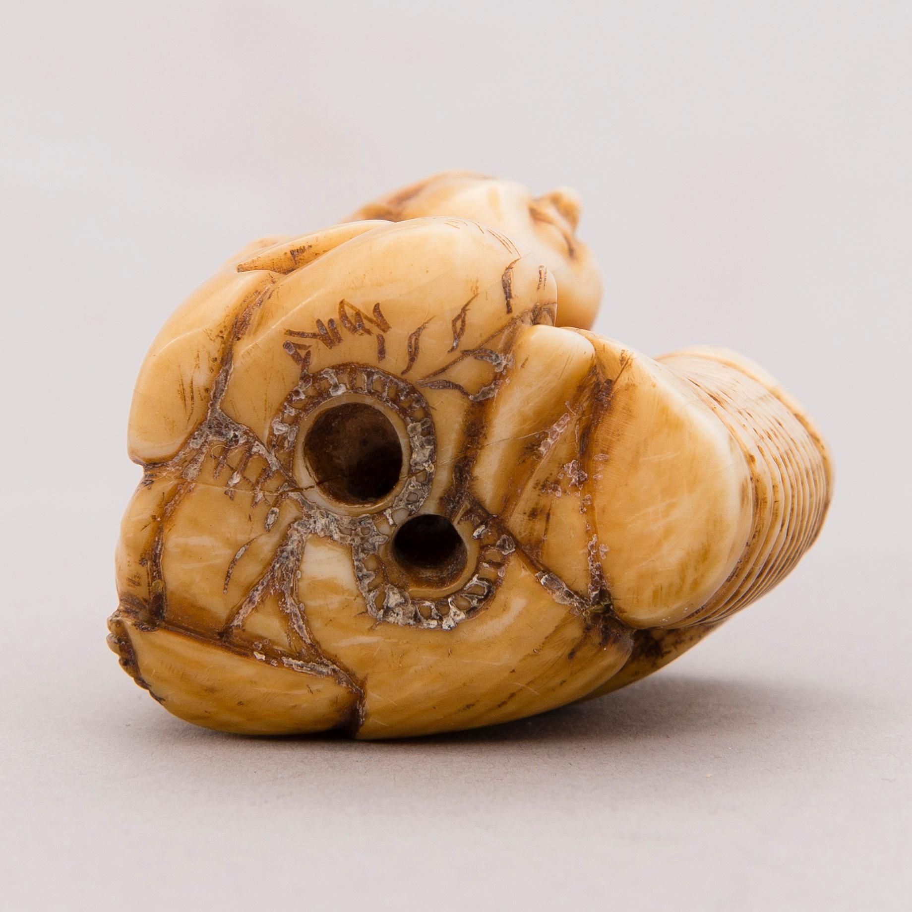 A 19th century Japanese bone netsuke.