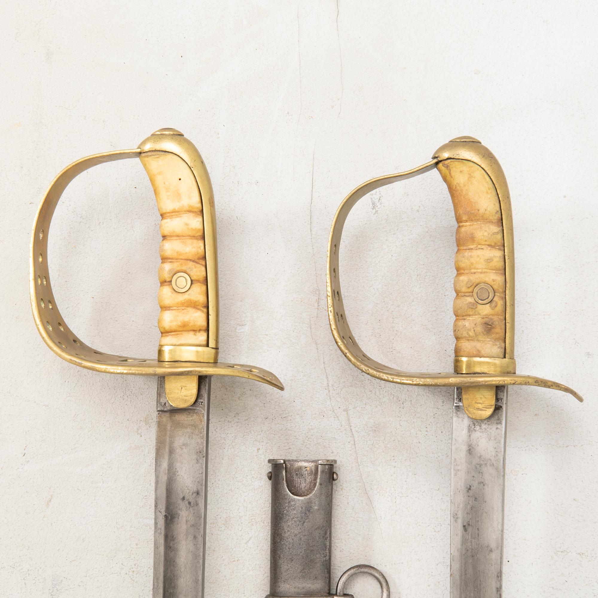 Two Swedish cavalry swords 1867 pattern, one with scabbard.