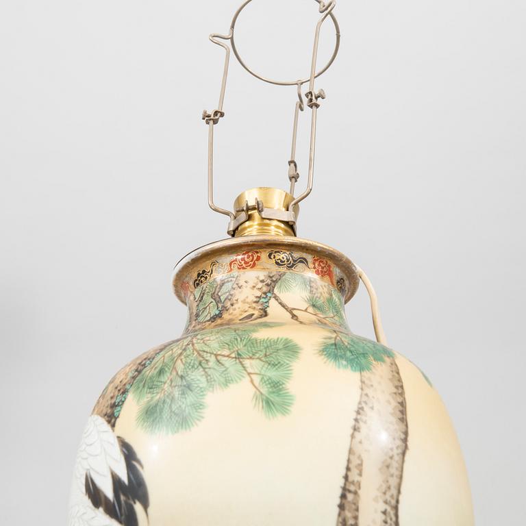 A pair of early 1900s Japanese porcelain table lamps.