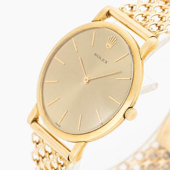 Rolex, 18K gold, with an 18K gold bracelet, wristwatch, 31.5 mm.