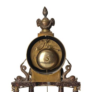 A late Gustavian ormolu and 'Blyberg' porphyry portico clock by E. Engelbrechten (watchmaker in Stockholm 1815-45).
