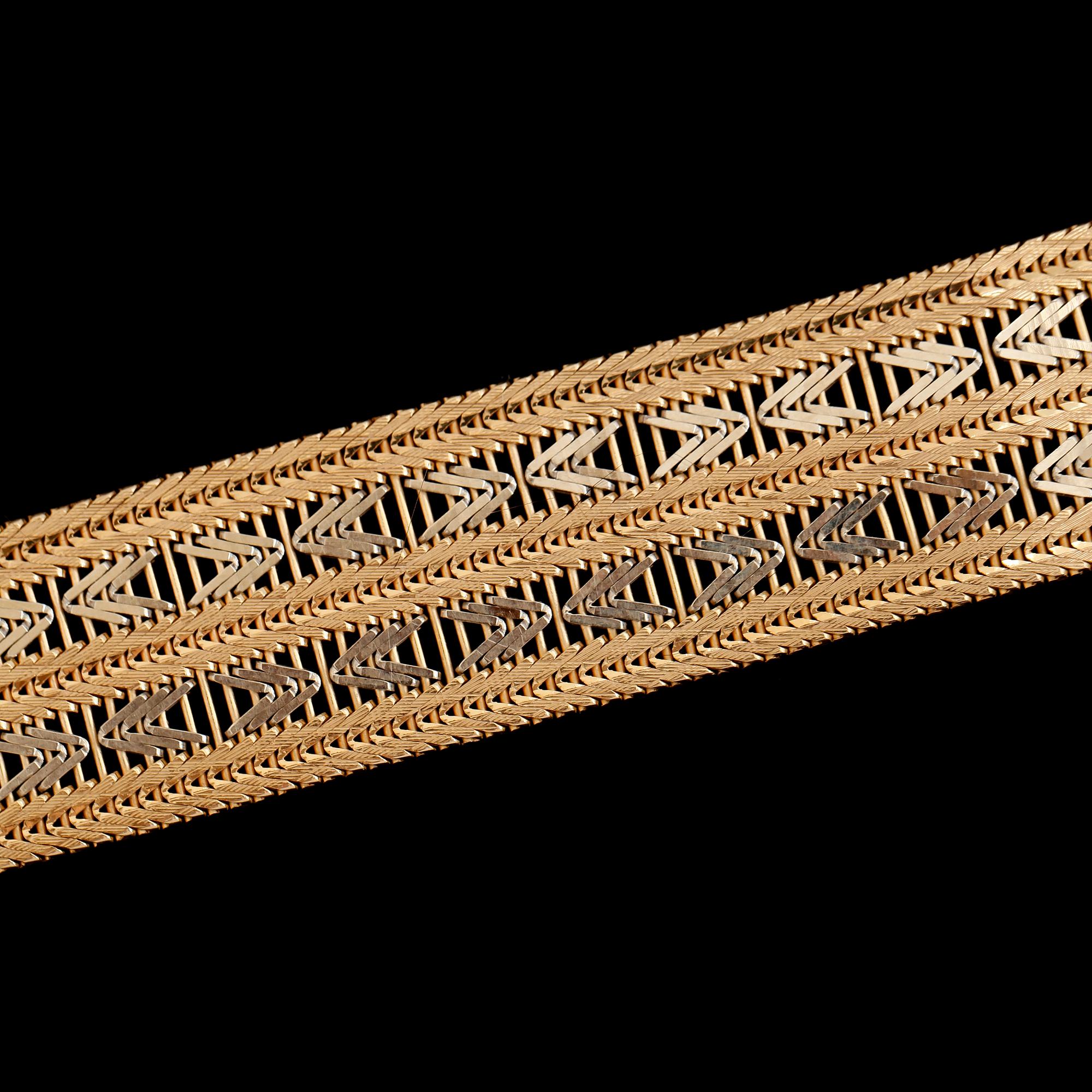 ARMBAND, 18K rött och vitt guld. Vikt ca 58 g.