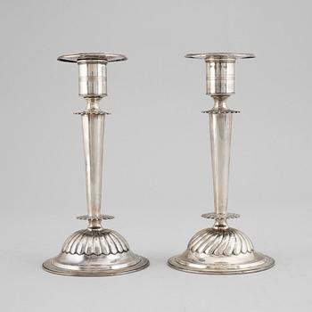 A pair of Empire silver candle sticks, 1823.