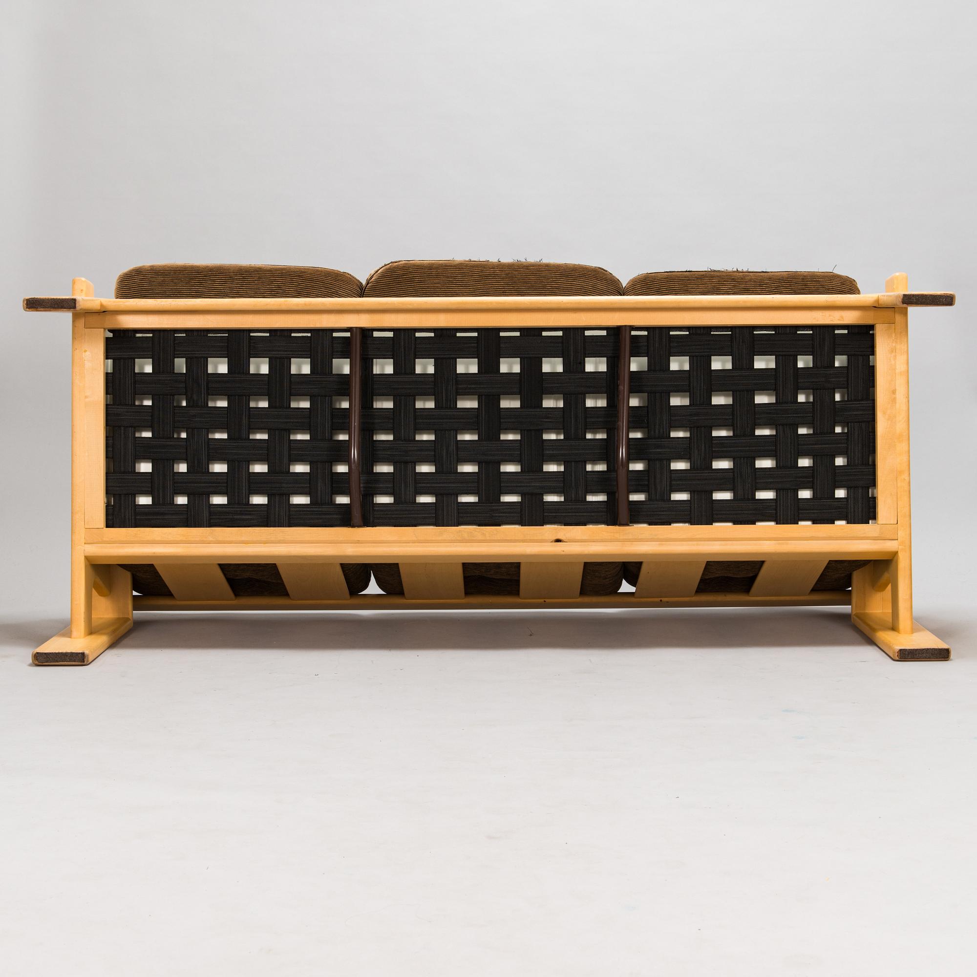 Esko Pajamies, A pair of 1970's 'Bonanza' armchairs, coffee table and sofa for Asko.