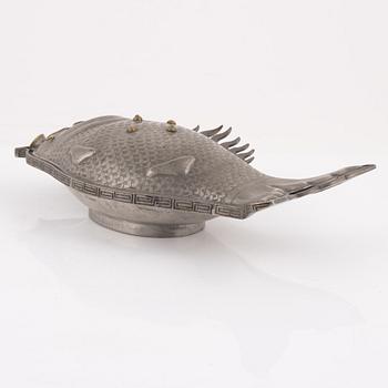 A pewter jelly mould with lid.