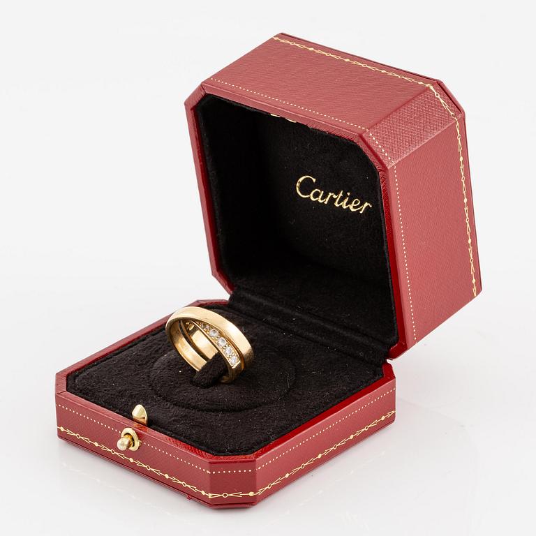A Cartier ring, "Nouvelle Vague", 18K gold with round brilliant-cut diamonds.