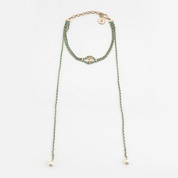 Chanel, a silver tone pearl and leather necklace.