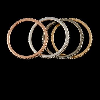 RINGAR, 4 st, 9K olikfärgat guld med briljantslipade diamanter 1.20 ct. Vikt 8,3 gram.