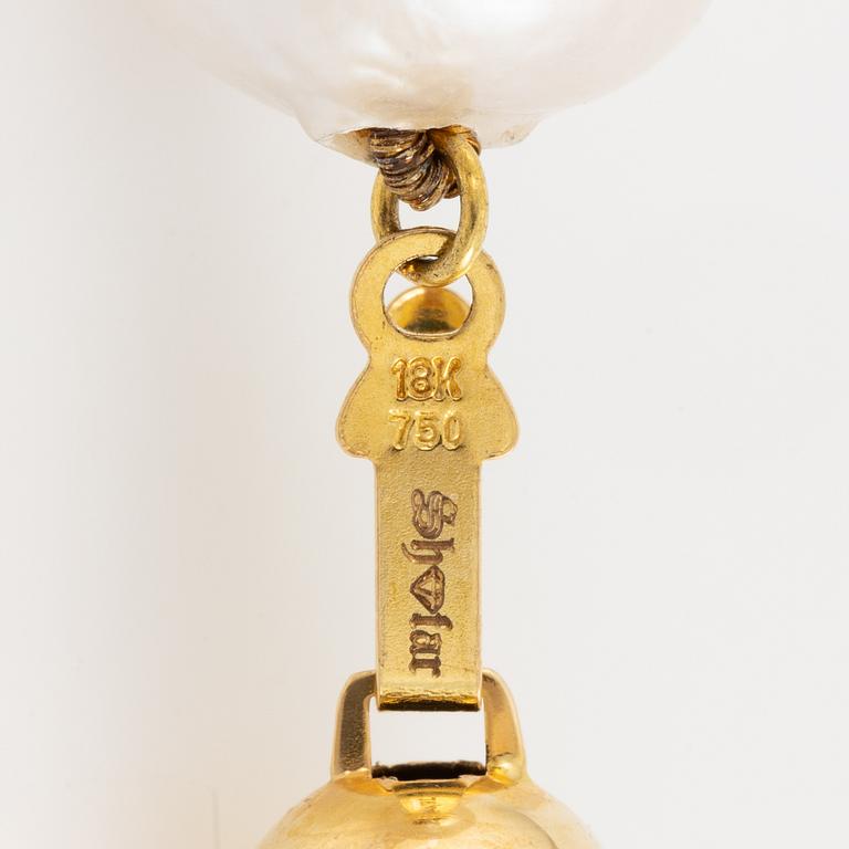 Collier med odlade sötvattenspärlor, lås 18K guld.