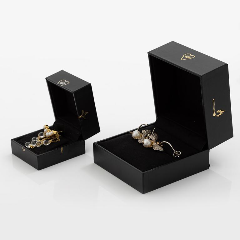 Maria Nilsdotter, a single earring, "rain earring" and a pair, silver with pearls and quartz.