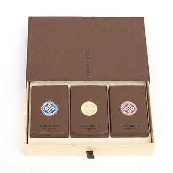 Three pack of cards by Louis Vuitton.