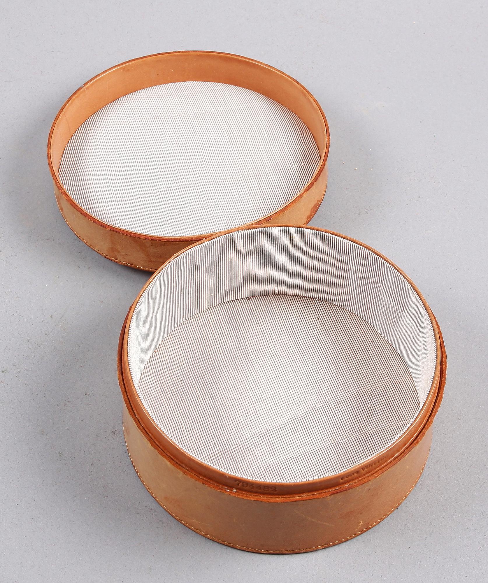 ASK  skinn. Louis Vuitton.