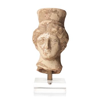 A pottery head of an elegant lady, Hellenistic, presumably 5th-3rd Century B.C.