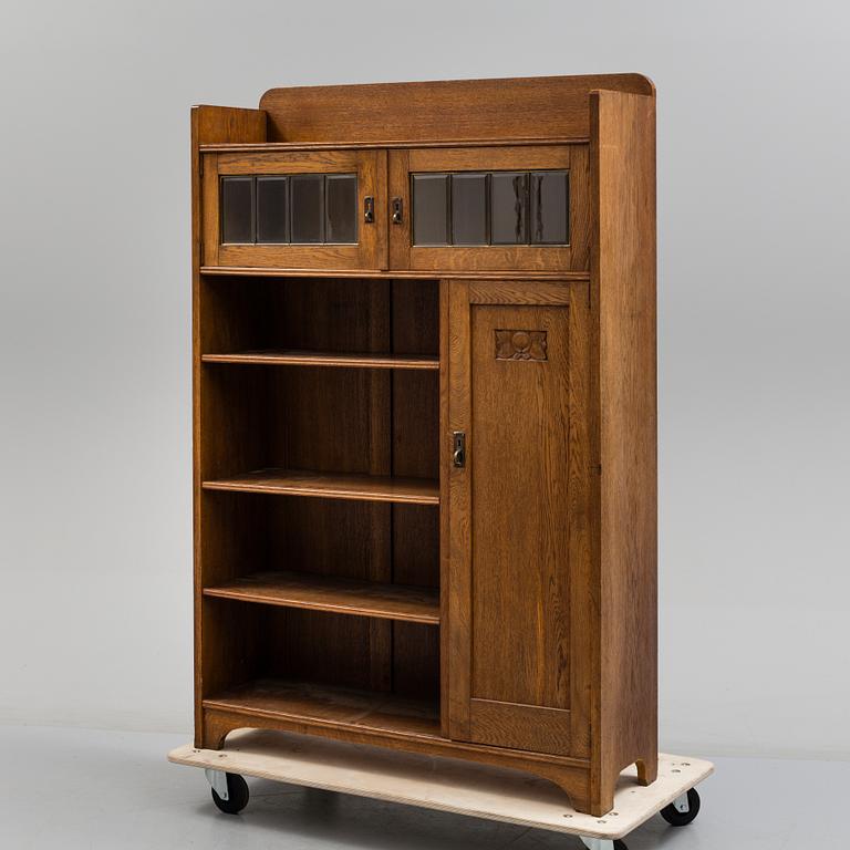A early 20th century Jugend Cabinet veneered with oak.