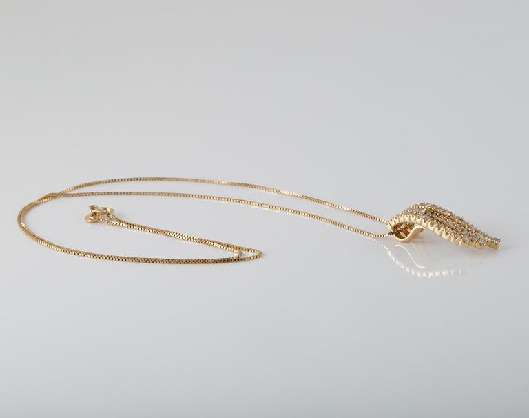 HÄNGE , 14K guld med briljantslipade diamanter ca 1.20 ct. Vikt 5,4 gram.