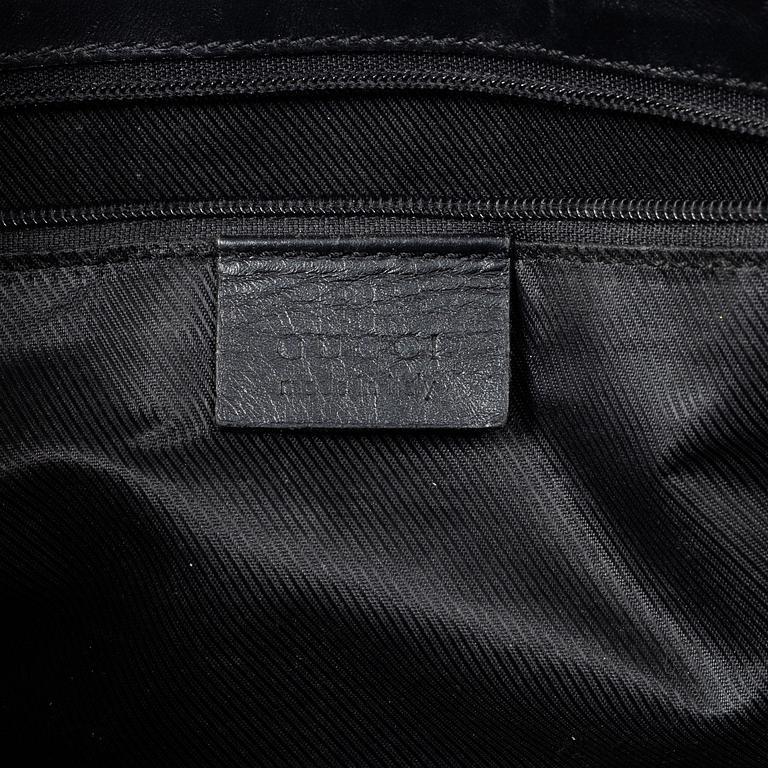 Gucci, a 'Jackie' bag.