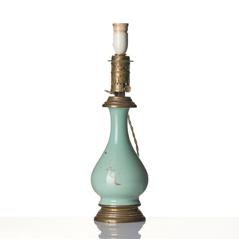 A celadon vase made into a lamp, circa 1900.