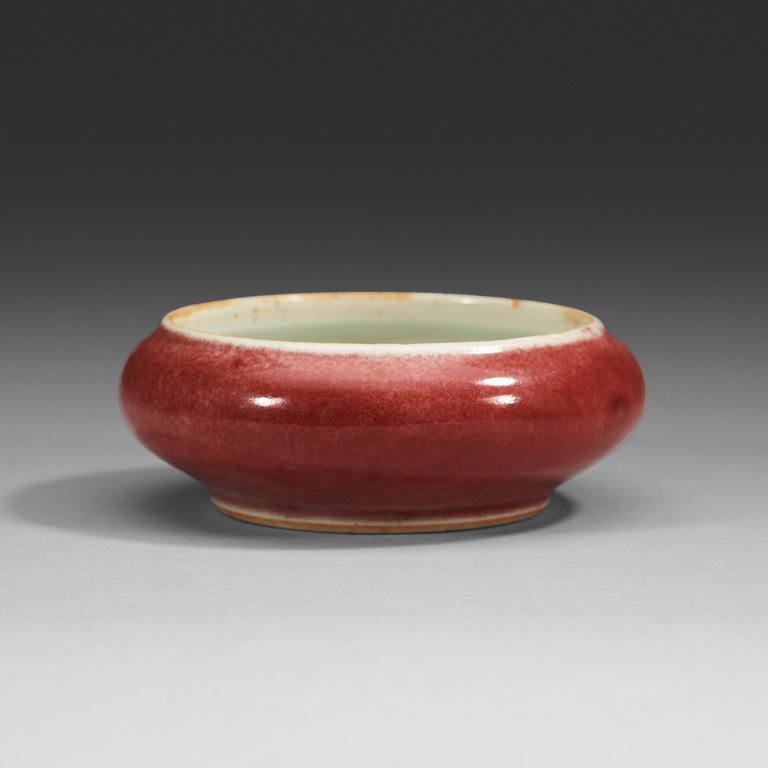 A sang de boef glazed brush washer, late Qing dynasty (1644-1912), with Kangxi six character mark.