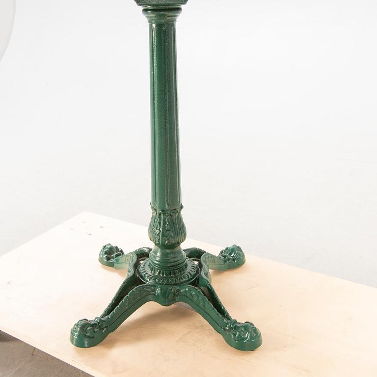 Table, cast iron base, 20th century.