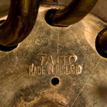 PAAVO TYNELL, A mid 20th Century brass chandelier for Oy Taito Ab.