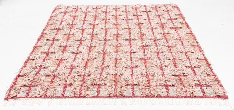 A rag rug and knotted pile in relief,ca  290 x 188 cm.