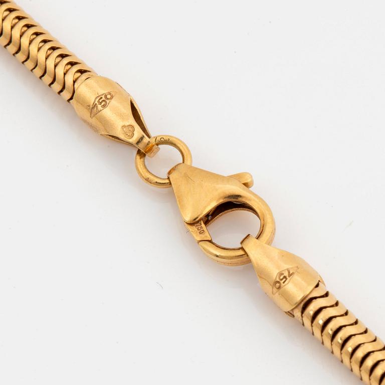 Peter de Wit, Margareth Sandström, a pendant, Linköping 1995, 18K gold and a total of 0,15 ct diamonds.