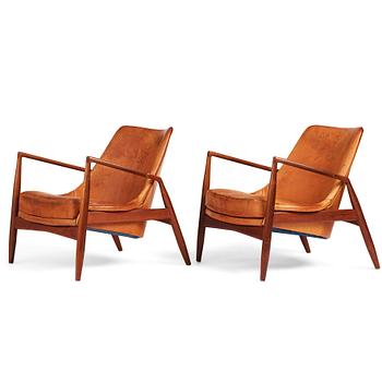 419. Ib Kofod-Larsen, a pair of teak and cognac coloured leather "Sälen" chairs, for Olof Perssons Fåtöljindustri (OPE), Sweden, 1950-60's.