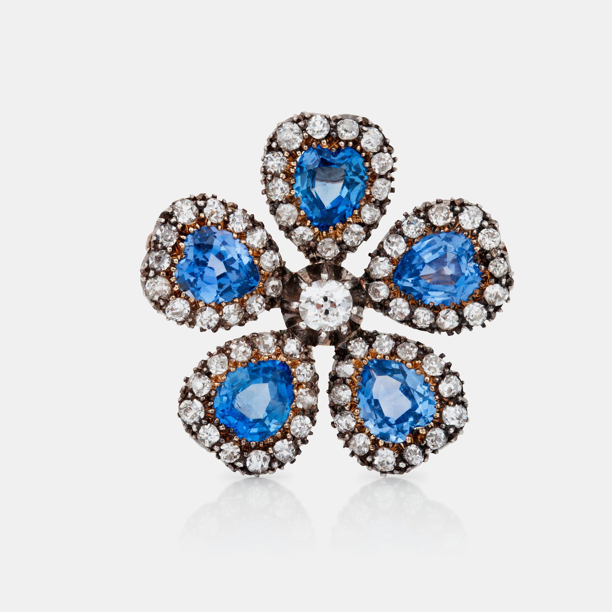 A heart shaped sapphire and old-cut diamond brooch/pendant.