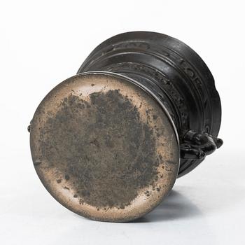 Mortar and pestle, dated 1600. Baroque.