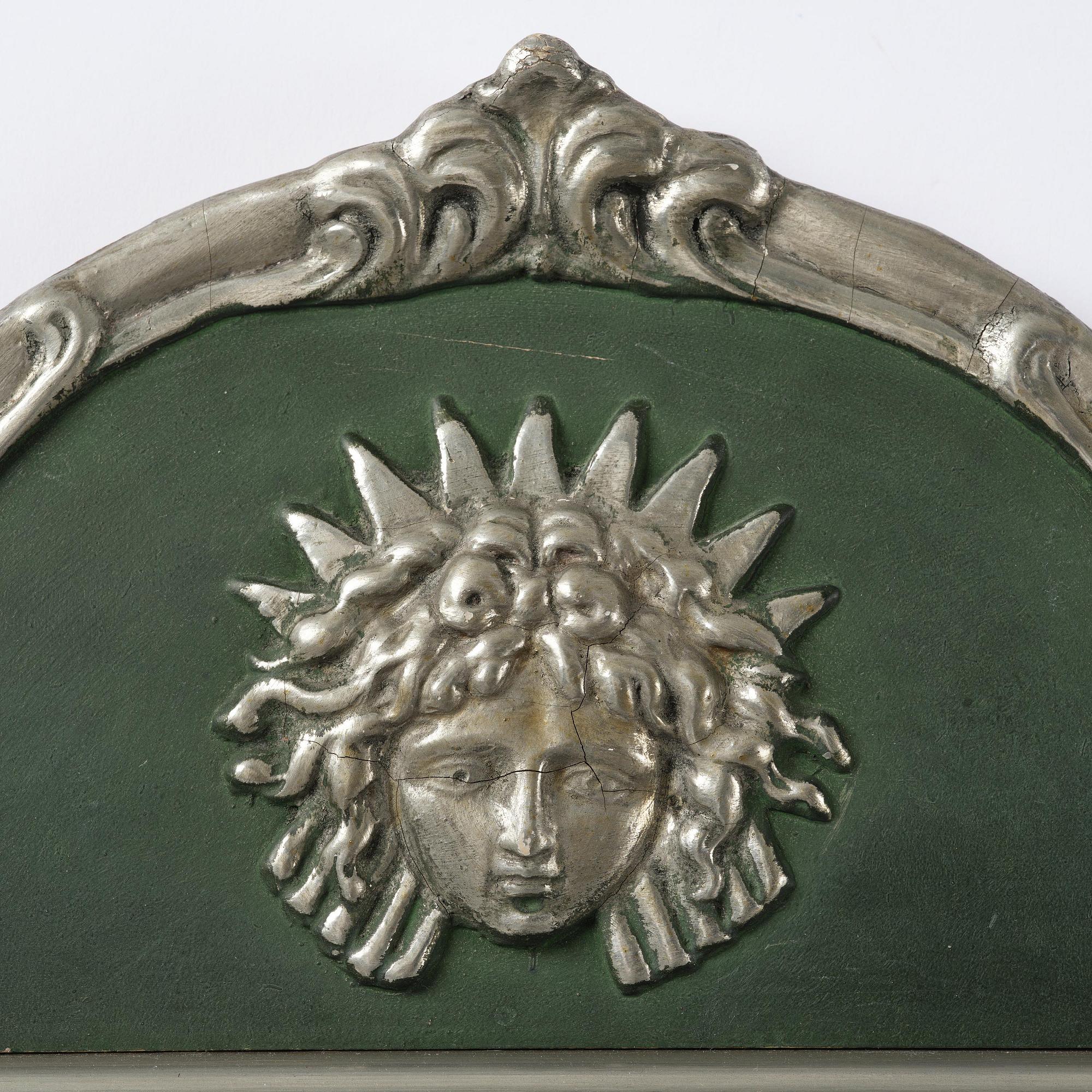 Swedish Grace, a wall mirror.