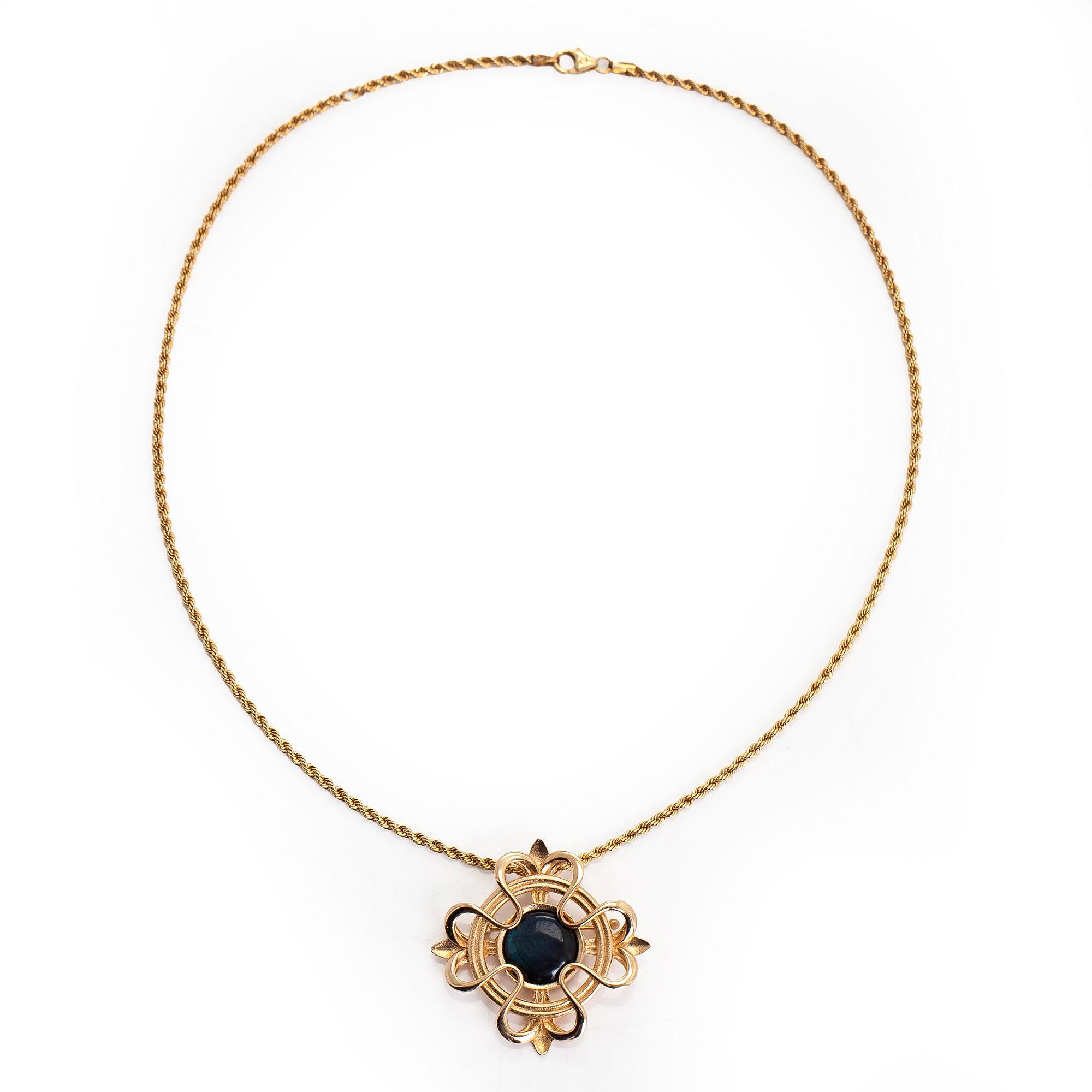 Kalevala Koru, a pendant/brooch with chain, "Lily", 14K gold and spectrolite. Helsinki 2002.