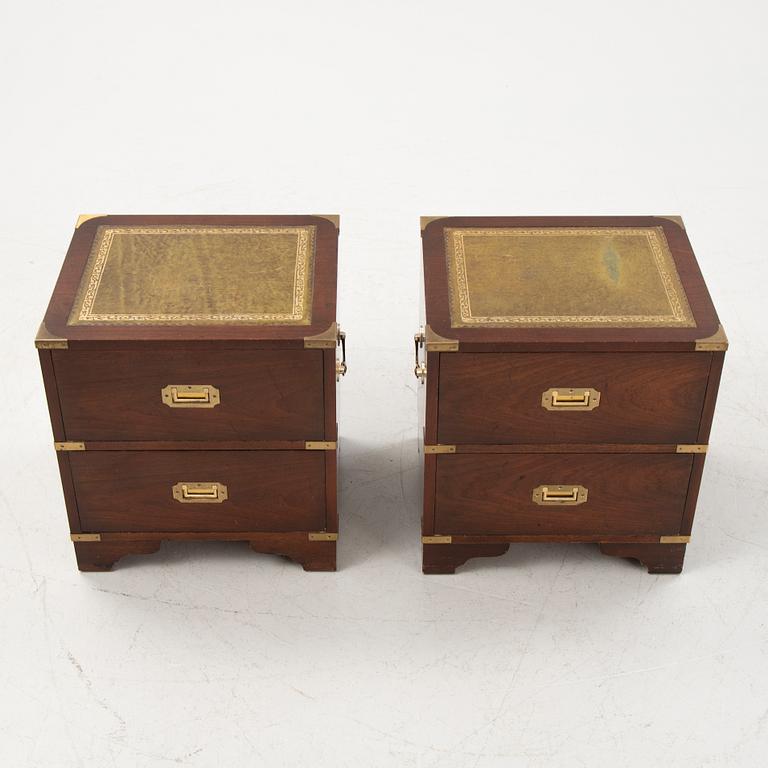 A pair of english style bedside tables from the second half of the 20th century.