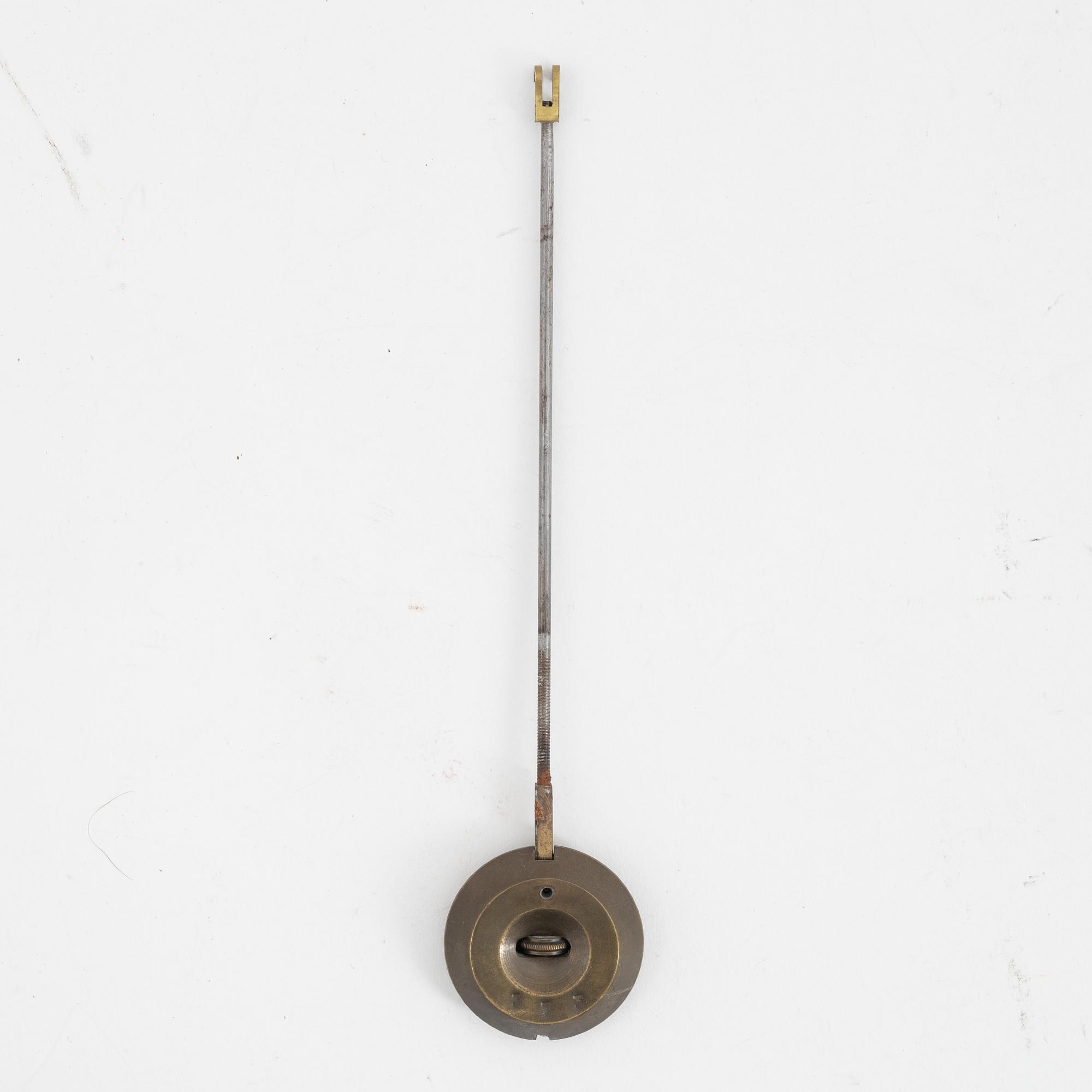 A French Empire gilt bronze mantle clock, early 20th Century.
