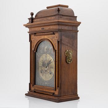 A walnut mounted bracket clock, 18th/19th Century.