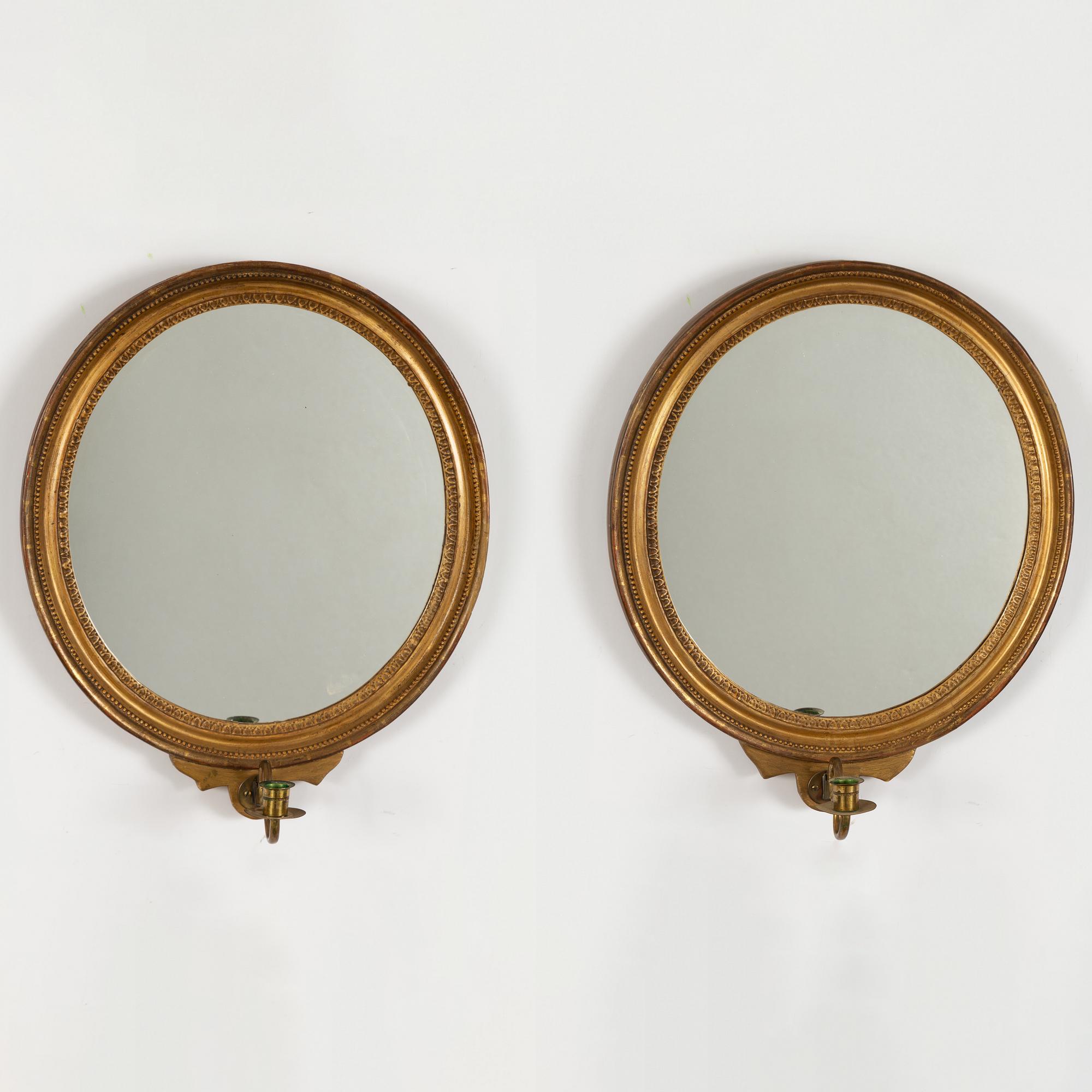 A pair of Gustavian style mirror sconces, early 20th centruy.