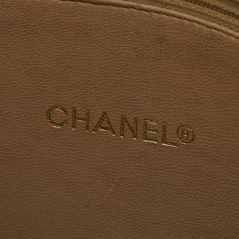 Chanel, a beige leather handbag, 1986-1988.