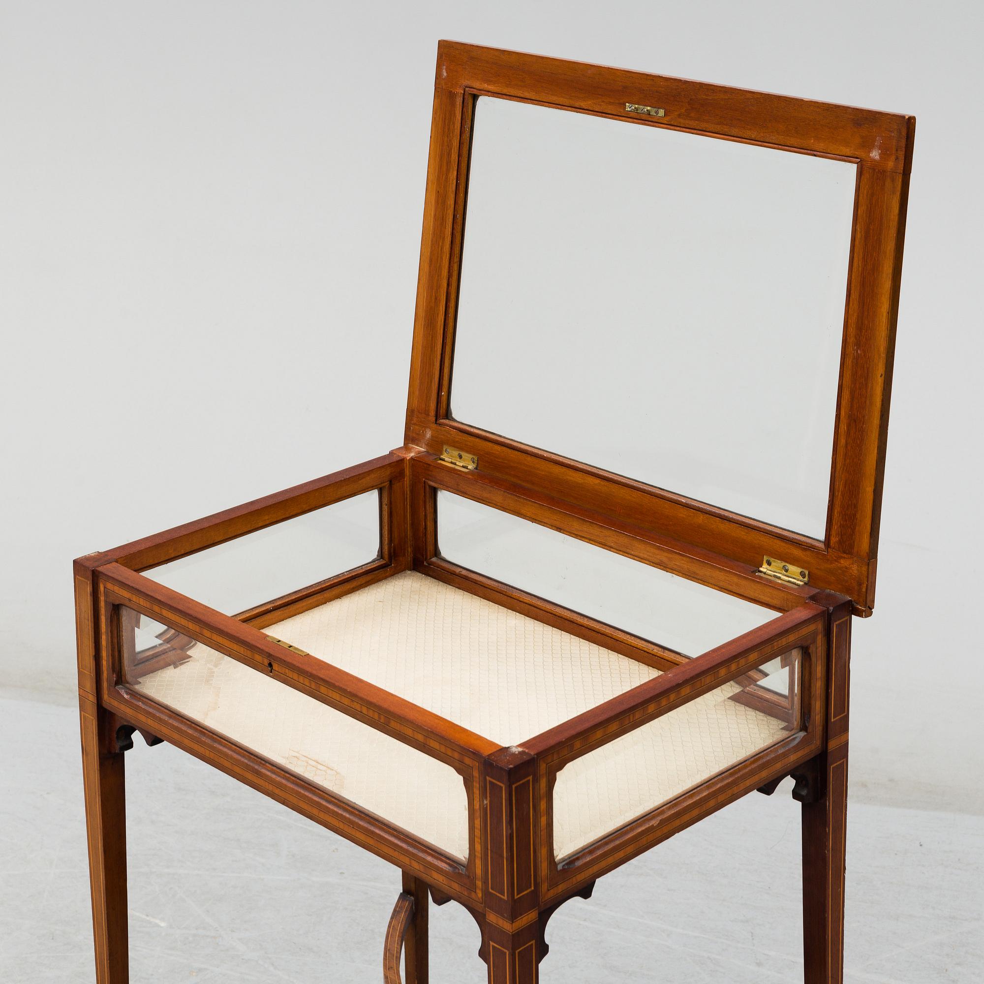 An early 20th century display table.