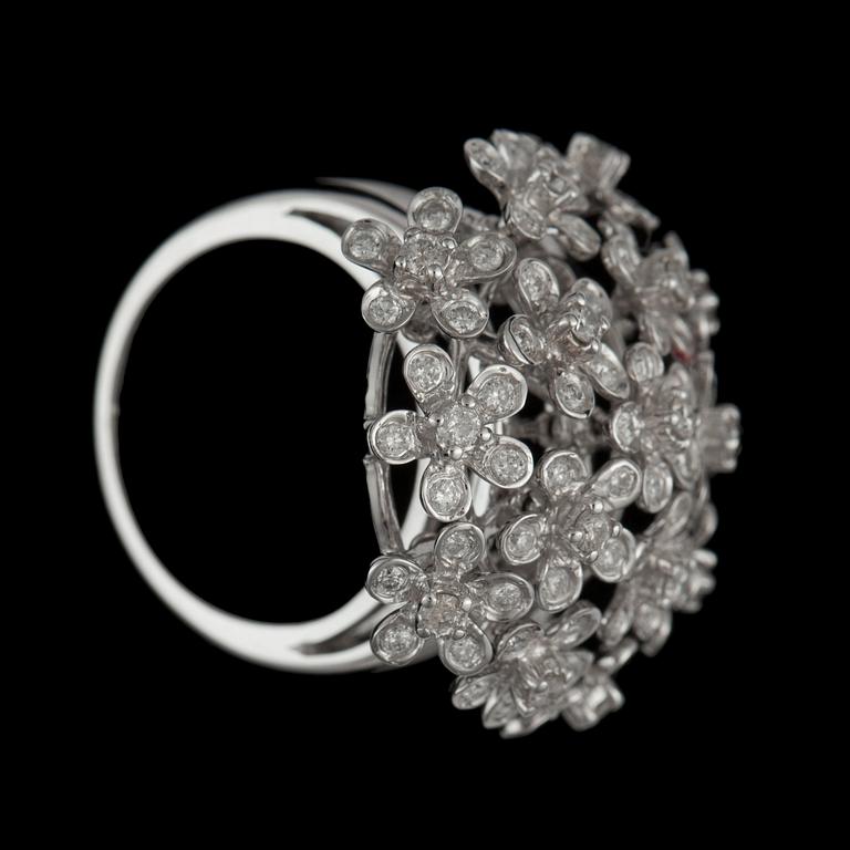 A diamond, 1.29 cts in total, ring. Diamonds in moveable flower settings.